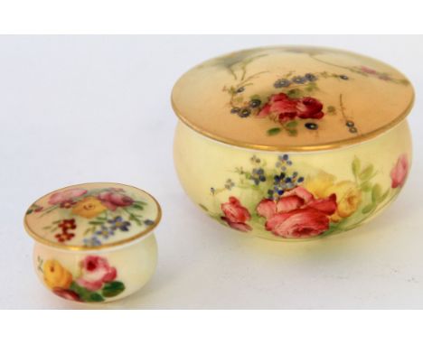 Two Royal Worcester hand-painted blush ivory circular lidded trinket potsEach painted with roses and foliate, each with puce 