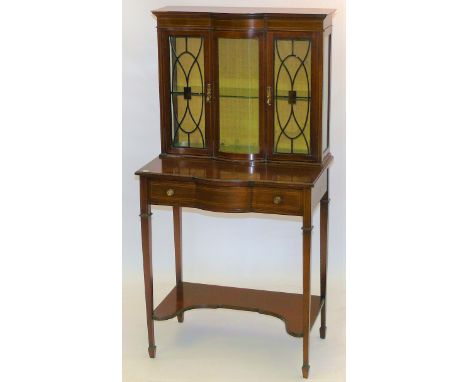 An elegant and diminutive Edwardian inlaid mahogany side cabinet by Buckley & Prockter Ltd of OldhamThe bowed upper section f