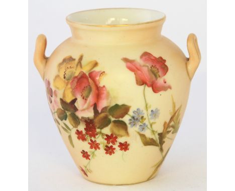 A Royal Worcester blush ivory twin handled barrel vaseDecorated with flowers and foliage, puce factory marks and date code fo