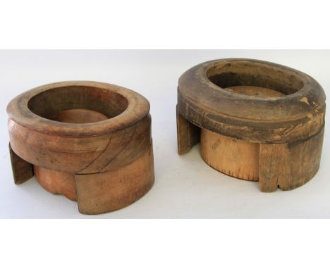 Two vintage fruitwood hat blocks and standsEach of typical form with oval stands, height 16cm, length 26cm