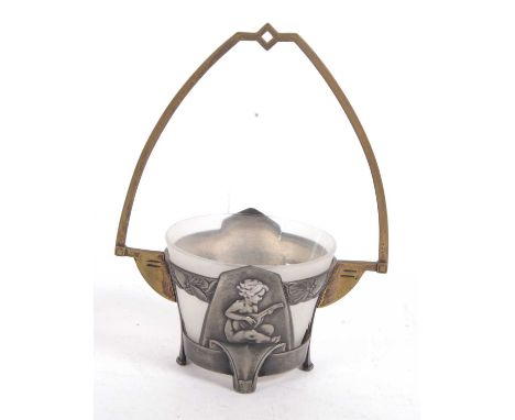 A WMF Art Nouveau mixed metal basket and frosted glass liner, the pierced body decorated each side with children playing musi