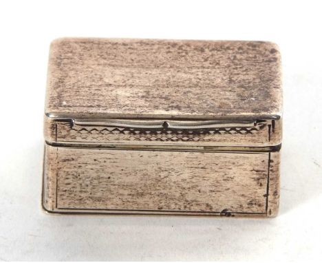 An unusual George IV silver snuff box of plain rectangular form, hinged lid opening to a plain interior, beneath a hinged rel