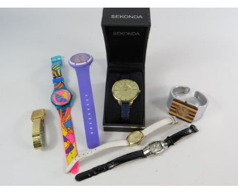 Selection of ladies quartz wristwatches including Sekonda, Timex and Tikkers.