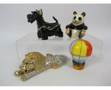 Three metal hidden treasures style trinket boxes plus one ceramic hot air balloon trinket.