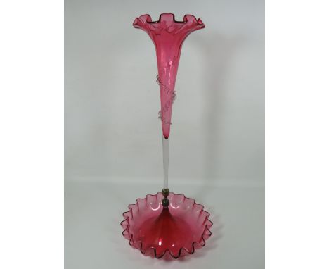 Beautiful Victorian Antique Cranberry Glass Epergne in excellent condition  and measures 21 inches tall. It has a brass conne