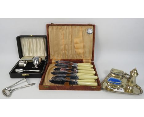 Sterling silver Egg cup, napkin and spoon set, plus a vintage cruet set and fish cutlery set etc. Total silver weight 67.9 gr
