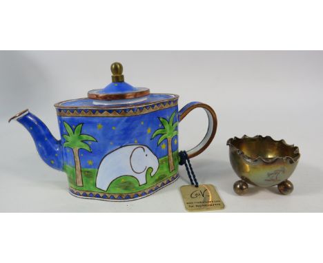 Small sterling silver salt and a Trade plus Aid miniature teapot.