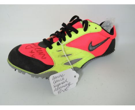 Single Nike Running shoe which has been autographed by Denise Lewis.  See photos