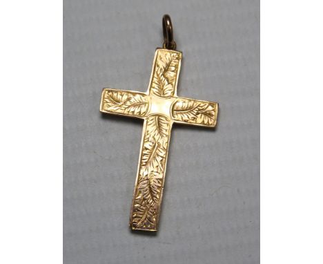 9ct Gold Crucifix pendant, 4cm by 2cm. 1.5 grams.