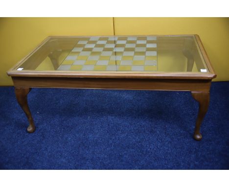 Coffee Table with glass top and chessboard design H:16 x W:40 x D:23 inches see photos. 