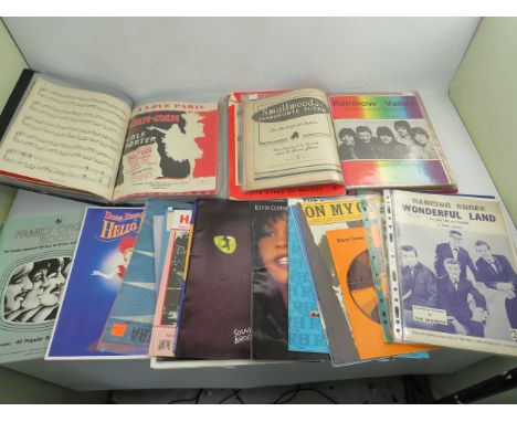Album of assorted Phone cards plus two full albums of Vintage Sheet music plus loose examples. See photos.