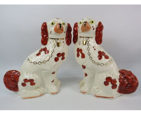 Pair of Arthur Wood Staffordshire Spaniels, 11.5" tall.