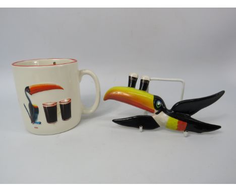 Carltonware Guinness Toucan wall plaque plus a Gilroys Toucan mug.