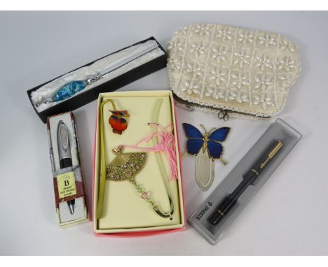 Mixed lot to include a beaded bag, Murano glass letter opener, Parker pen, Bookmarks etc.
