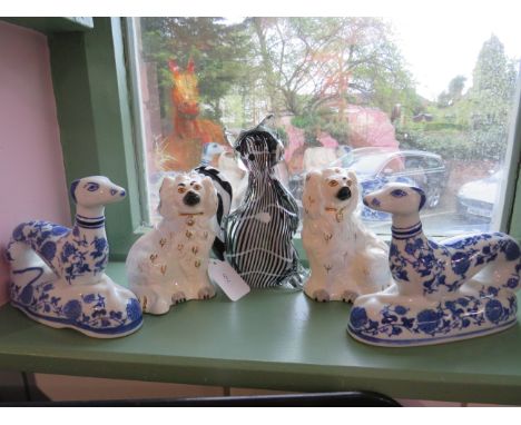 Good mixed lot of Small Beswick Mantle dogs, Two Oriental Blue &amp; White Greyhounds plus a large art glass cat paperweight.