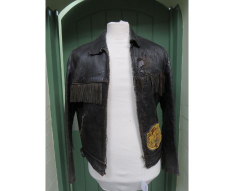 Vintage, 1950's or 1960's Leather Motorcycle jacket with fringed front, back and sleeves. Tiger's head emblem to front and la