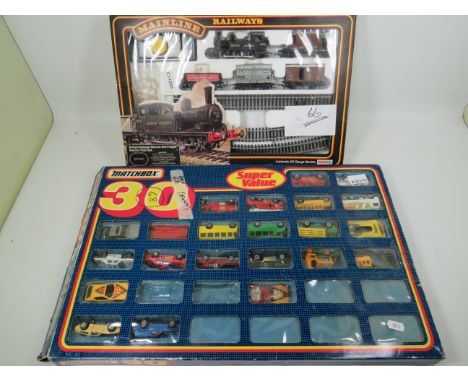 Palitoy 00 Train set, boxed but incomplete plus a Matchbox multi car gift set also incomplete. See photos.