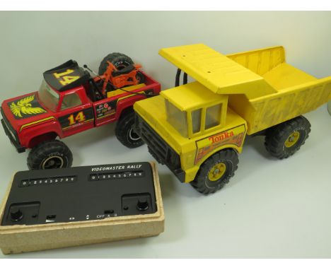 Large Tonka metal models. A tipper truck and pick up truck with motor bike. Both in very good but dusty condition.. A Video M