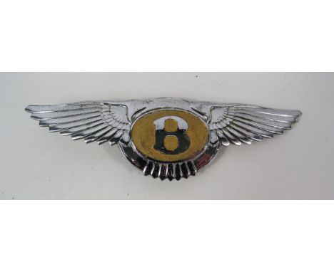 Vintage Bentley flying B car badge.