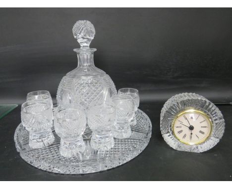 Excellent Crystal Decanter with matching tray and glasses. Also a Waterford Crystal Quartz Clock. See photos. 