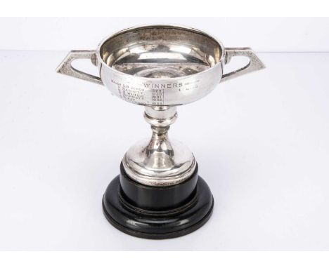 A George V silver presentation twin-handled trophy with weighted base, 14 cm high 10.3 ozt. Engraved for Aylsham and District