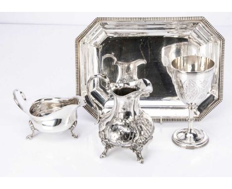 A Victorian silver goblet and three silver plated items, 3.68 ozt and 14.2cm high, with an entrée dish, sauce boat and milk j
