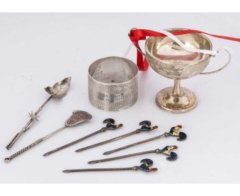 A set of five silver and enamel cocktail sticks and four other items