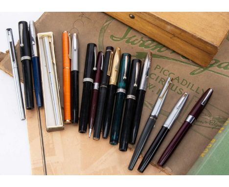 Fourteen modern Sheaffer fountain pens, in various colours, including two with 14K gold nibs, along with red Sheaffer rectrac