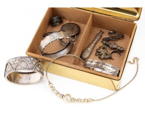 A small collection of silver and white metal jewels, including a bangle with applied flowers of the Home Nations, Scotland, I