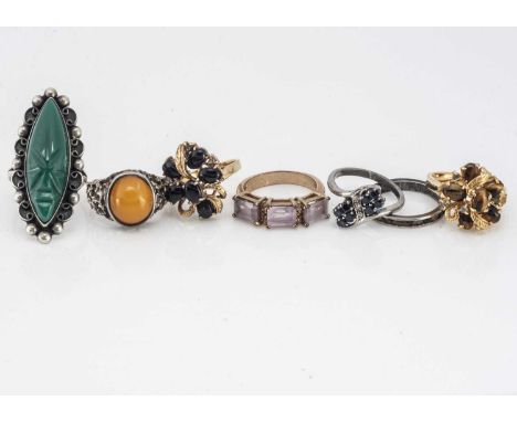 A collection of silver and gilt metal dress rings, including a Mexican example, 15g silver