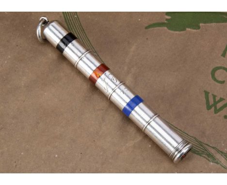 A late Victorian triple retractable pencil from J.C. Vickory of London, 11cm long including ring, having enamel bands to thre