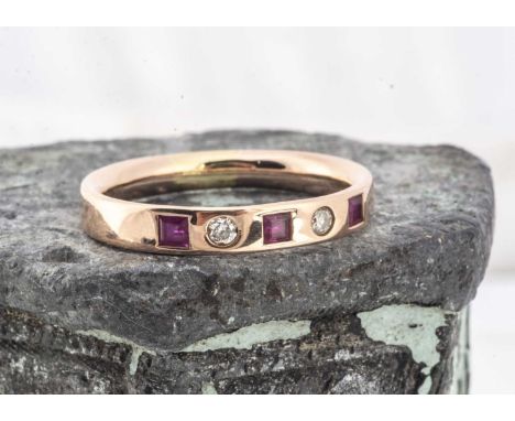 A contemporary five stone ruby and diamond 18ct ring, the sunken set square cut rubies alternately set with two brilliant cut