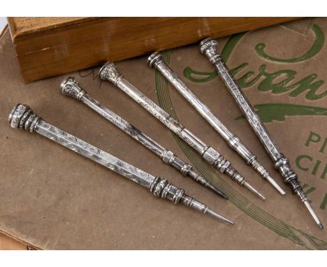 Five Victorian silver and white metal retractable pencils