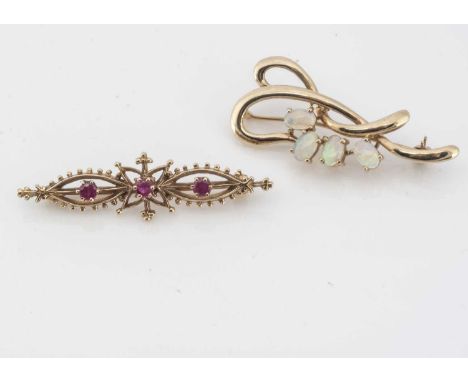 Two gem set brooches, including an opal 9ct gold scroll bar brooch, 4.5cm x 1.8cm and a ruby openwork bar brooch 4.8cm x 1.2c