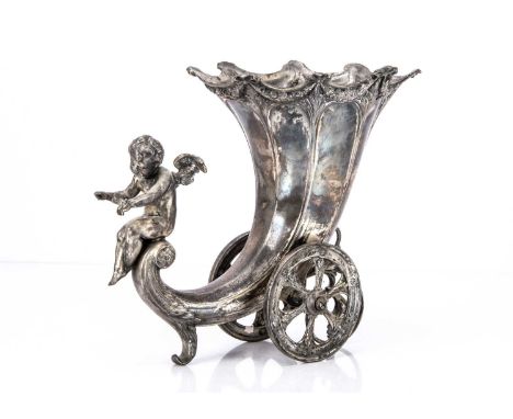 An Edwardian period or later silver plated centrepiece, the cornucopia on wheels with cherub, 23.5cm high