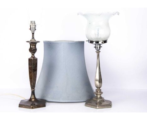 A 1920s silver filled table lamp base, together with a silver plated table lamp base with glass shade, 53cm, both fitted for 