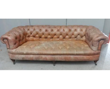 Large Victorian 3 Seater Deep Buttoned Pale Tan Leather Chesterfield on 3 turned front supports with brass & ceramic castors 