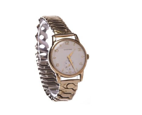 GENTLEMAN'S GARRARD NINE CARAT GOLD MANUAL WIND WRIST WATCHthe round dial with applied gold coloured Arabic numerals and rhom