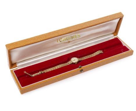LADY'S LONGINES NINE CARAT GOLD MANUAL WIND WRIST WATCHoriginally purchased 1963, the round dial with applied baton hour mark