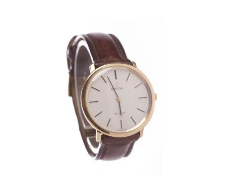 GENTLEMAN'S OMEGA NINE CARAT GOLD MANUAL WIND WRIST WATCHsigned 17 jewel movement numbered 32449838 the round dial with appli
