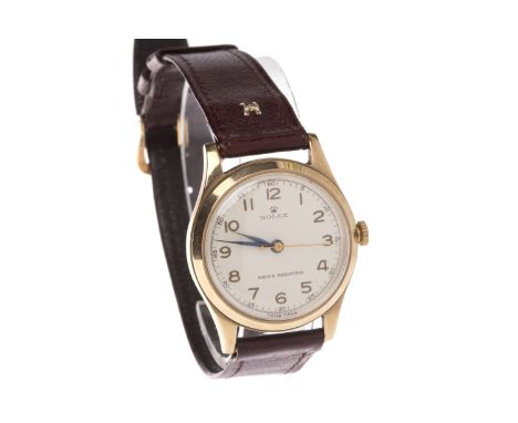 MID SIZE ROLEX SHOCK RESISTING NINE CARAT GOLD MANUAL WIND WRIST WATCHsigned 15 rubis movement, the round dial with applied g