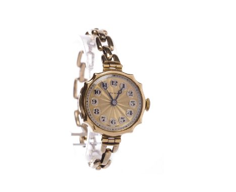 LADY'S CYMA EIGHTEEN CARAT GOLD MANUAL WIND WRIST WATCHthe round gold sunburst dial with Arabic numerals, outer seconds track