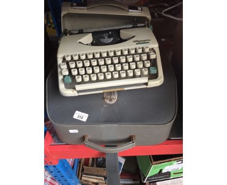 A Boots Mode 42 typewriter and an Olympic Splendid 33 typewriter 