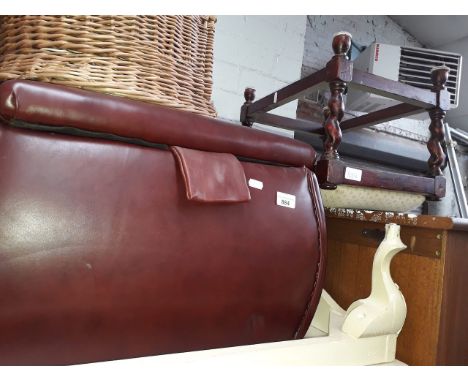A leather pouffe and a twist leg stool. 