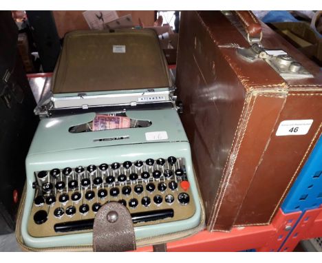 A vintage leather case and a Lettera 22 typewriter.Condition:--Leather case has scratch to top as per photo.-Leather case has