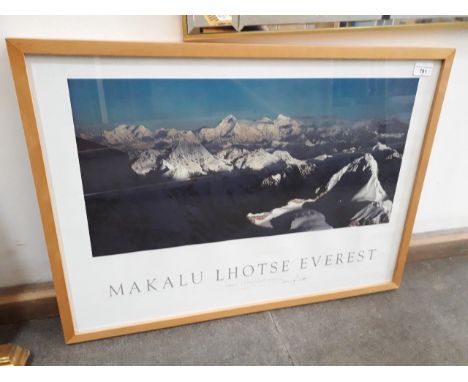 A photographic print depicting mount Everest signed in pen by Doug Scott, glazed and framed 73cm x 53cm. 