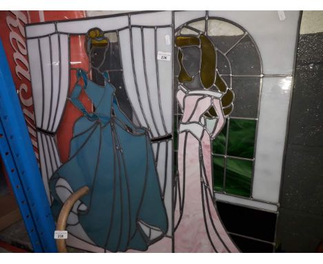 2 leaded glass panels featuring ladies in coloured glass approx 80x50cm.&nbsp;Condition - one panel with two cracks although 