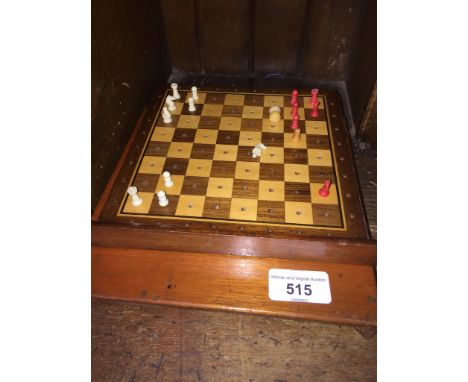 Part chess set in mahognay sliding case 