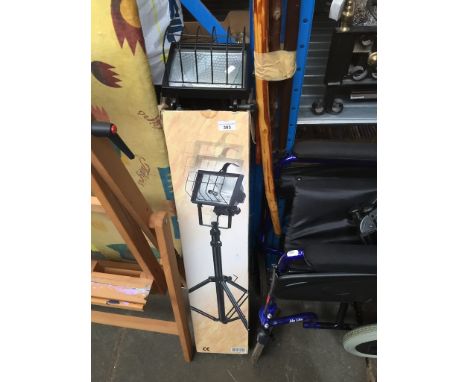 A swivel worklamp on extendable tripod.&nbsp;Condition - appears in working order, wear to box exterior but lamp appears good