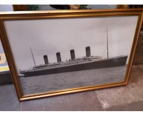 A print depicting the Titanic, glazed and framed 97cm x 68cm. 